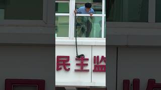 Heroic Cat Rescue! Brave Person Saves Cat from High Signboard #shorts