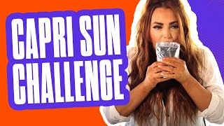 Oxbridge staff attempt the Capri Sun Challenge... 🥤