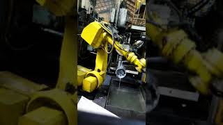 Mahajan Automation, Pune, Part unloading by refurbished Fanuc R 2000i 165F RJ3iB