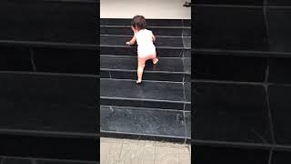 Baby crawling upstairs (12m3w)