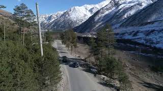 Road to the Snow Capped Mountains