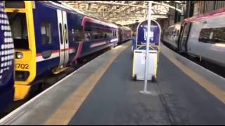 170425 And 158702 departing Glasgow Central