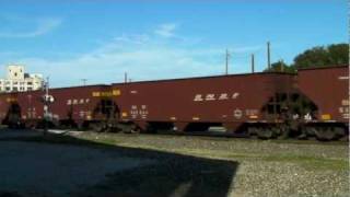 BNSF 8255 taconite train BLASTING thru Gainesville, Tx. 11/12/2011 ©