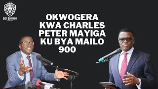 CHARLES PETER MAYIGA NGA AYOGERA KU TTAKA LYA MAILO 900