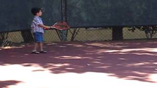 Boys playing tennis