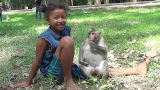 A Male Hunter Monkey Feel Love A  Young Girl Trying to stay and On her all time