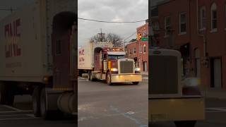 Peterbilt 389 truck gives a nice deep Longbell horn salute with a Freightliner in front of him!