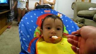 Baby Makoa spits out food