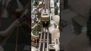 An #ogauge  trolley rides high above #O27 and #sgauge trains: 2023 holiday train show in Wall, NJ