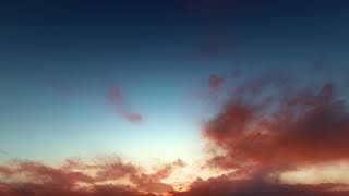 Red dramatic sunset or sunrise looping footage ( CGI 4k Stock Footage )