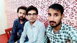 suleman with friends in home