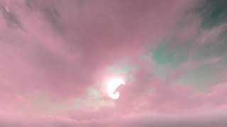 Intense unicorn pink storm clouds on cyan sky seamless loop ( CGI 4k Stock Footage )