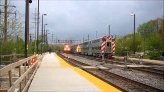 Metra Outbound Train meets a BNSF Hotshot Intermodal at Downers Grove IL. 4/14/12