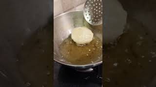 Luchi - puffed bread, fried in oil, made from flour, a Bengali specialty.