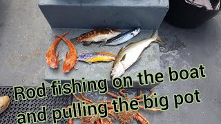 ROD FISHING ON THE BOAT