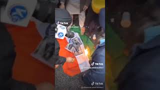 Protesters burning Indian Flag outside Indian embassy london & demanding justice