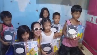 Giving school supplies and school uniform to our selected children affected by the flood