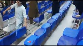 Afghanistan cricket fans smashing and throwing benches in the stadium after losing match to Pakistan