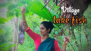 Monsoon rain special | Egg Kiri Roti with village Lake Fish cooking at village home in rainy day