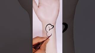 "E" letter mehndi design.