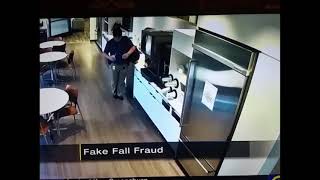 Fake fall  (FRAUD) caught on tape!