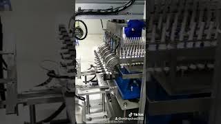 Automatic medical IV infusion connecting extension tube flow regulator assembling making machine