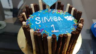 Aarav Celebrating Simba's First Birthday  with Dog Cake