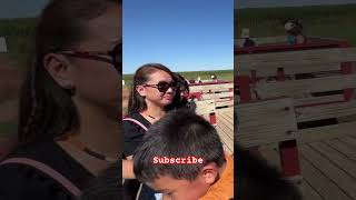 My Mom and my brother is enjoying the Tractor ride.