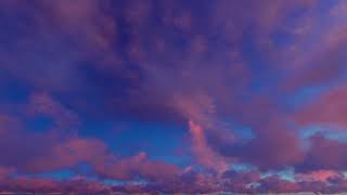 ( CGI 4k Stock Footage ) Misty purple epic sunset clouds