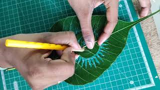 అశ్వత్ధ పత్రంపై ఓం లోగో #ఓం how to leaf cutting art. #leafart #om #trending #trendingreels