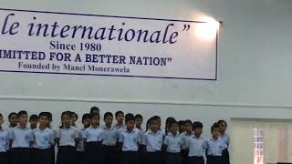 Thuheen played the flute at school on parents' day.