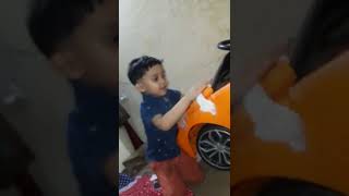 little boy's dedication for his car#cleanliness#