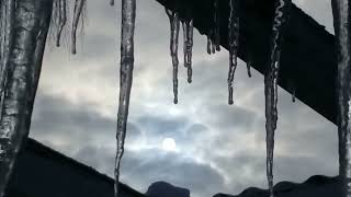 9 am Sun 🤔🌞☀️SE sky Alberta,  February 8, 2022. 3 foot icicles.🥶☃️