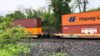 A Norfolk Southern stack train traverses Salpino Curve near Tunnelhill, PA.