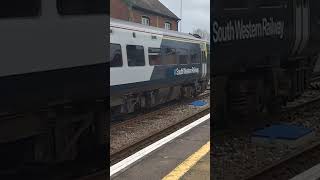 SWR 159015 and 159003 depart Pinhoe station 6/4/24