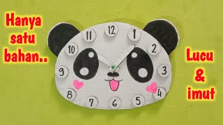 Jam dinding dari kardus bentuk panda