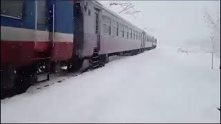 #snowfall2024  Bramullah banihal train running through snowy landscape #kashmirvalley