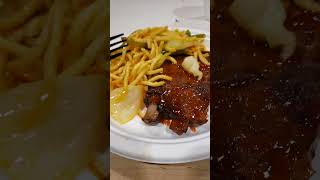 Vegetables lo mein and barbecue ribs.