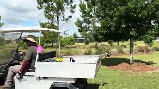 Golf cart drive, passing the new CVS under construction. The Villages, Florida.