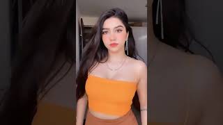 hot Indian girl in orange deep neck top | Hit like for | Tatto in Hand