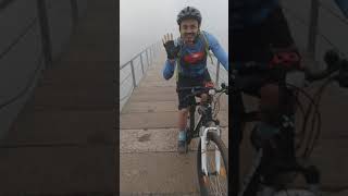 cycling in winter mist