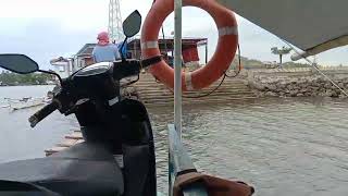 Filipino: Motor loaded on the boat is dangerous on rough sea ( Bohol Island)