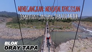 MENEGANGKAN:  MERASAKAN KENGERIAN GOWES MELINTASI JEMBATAN GANTUNG TUA 100 METER di ORAY TAPA