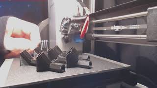 Printing seven connectors for the dodecahedron.