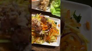 Mango salad and seafood spring rolls