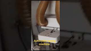 Automatic taping machine