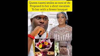 Queen naomi smiles as ooni of ife proposed a short vacation to her with a flower bouquet, queen naom