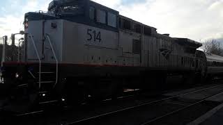 Amtrak train P064 entering Amsterdam with Dash 8 leading