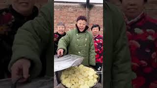 Grandma cooking potatoes fountain