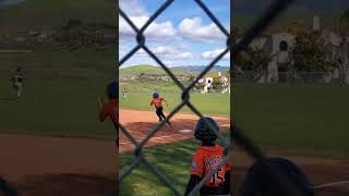 Kid hits amazing triple.